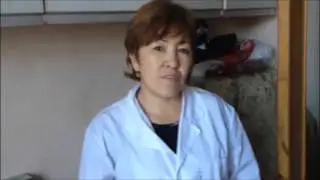 Сиделка с проживанием в белом халате