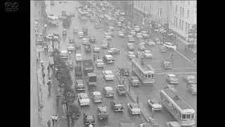 [Public Domain] 1961 (Showa 36). Japan. Hibiya Street crowded with cars.