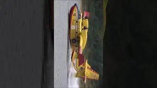 Italian Canadair CL-415 water scoop from lake #canadair #firefighter #avgeek