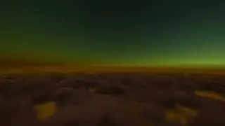 Flying through the clouds at dusk