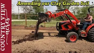 Adding compost and amendments to our clay garden soil.  Getting it ready to plant.