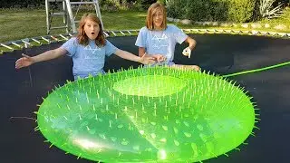 TRAMPOLINE vs GIANT SPIKED WATER BOMB!