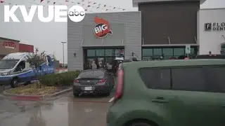 Dozens lined up in the rain for hours ahead of the opening of Shaq's new North Texas restaurant