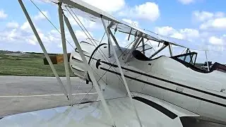 Getting into the pilot seat of a Waco biplane! Let's go fly!