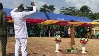 Apostle Doctor Isaac Afful is giving the word of God