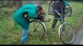 Two drunk guys, one stump and a bike.
