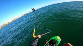 Slingshot UFO 7 m foil jibing training in light to moderate wind.