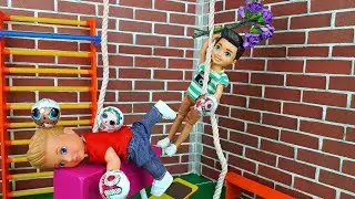 Dance is a gift. At the lesson of physical training. School Barbie - play with dolls