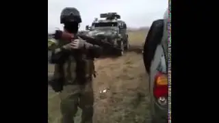 Бойцы АТО на фоне УРАГАНА