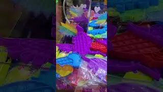 Won a Dino Popit from a Claw Machine 