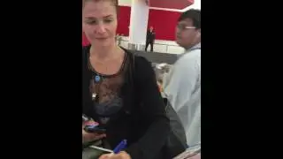 Helena Christensen signing autographs