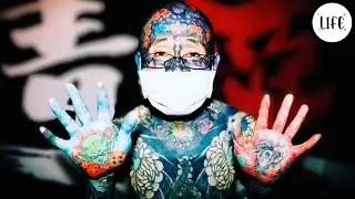 Novelist with tattoos all over