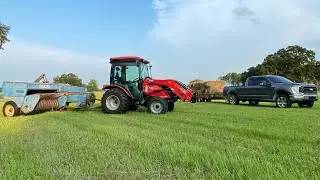 Raking and baling hay, surprise on the farm!