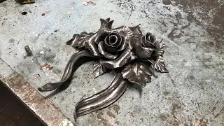 Forged panel of flowers