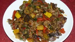 Chicken gizzards with vegetables. A budget-friendly option for a delicious main course.