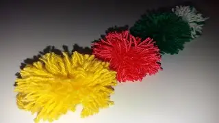 Помпоны из пряжи, первый способ с применением картона