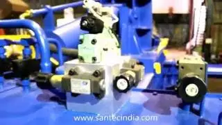 Scrap  Baler  - Triple  Compression  type  with  Feeding  Hopper ; SANTEC   GROUP