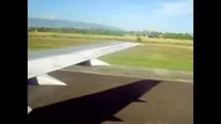 Boeing 737-400 Garuda Indonesia Wing view landing