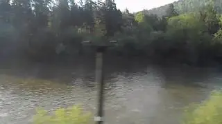 Река петляет на Южном Урале в Челябинской области из окна поезда