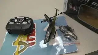 Военный вертолет на пульте управления