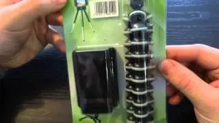 Déballage d'un mini trépied pour mobile.