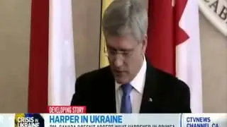 Mein Harper talks tough about Russia