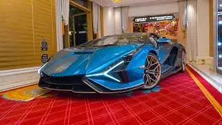 Lamborghini Sian Roadster Driving Through a Corridor