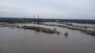 Паводок СКО Петропавловск. Ишим сильно поднялся, затопило всё поля поблизости и дорогу за дамбой. 23