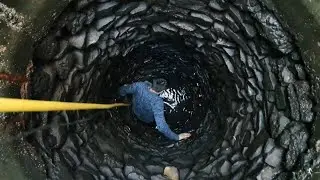 We were cleaning the fountain with old techniques from the house in the forest