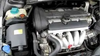 Volvo V70 2001 B5244S2 5-cylinder engine under the hood running idle