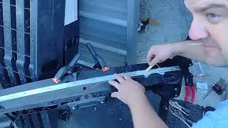 Fixing new damaged radiator support with JB weld and cherry max rivets.
