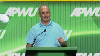 UAW President Shawn Fain speaking at the the American Postal Workers Union Convention 2024