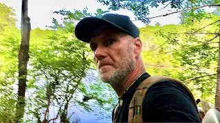 Halfway around this mountain pond I found a cool place that must have been a camp