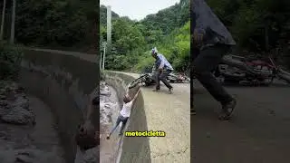 This man almost fell into the river after falling off his motorbike 😮