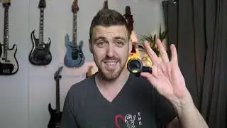 Your Third Guitar Lesson - White Strap - Lesson 3 - Tuning the guitar