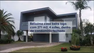 Casa com 271 m2, 4 suítes, frente lago em condomínio fechado Xangri-Lá RS