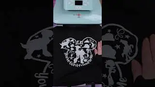 Use Rainbow Glitter HTV to transfer the sublimation pattern to the black cotton shirts.