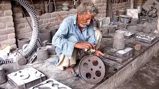 80 Years old man casting a metal gear