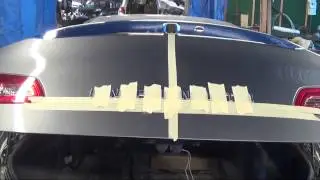 How to stick an emblem on a car evenly