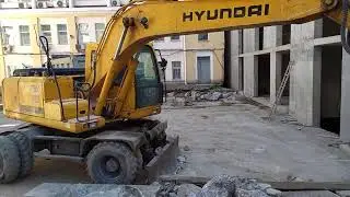 Экскаватор Hyundai r 170 w 7 с гидромолотом компании Техоптимум