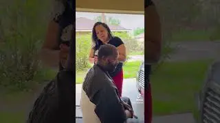Wife cutting my hair