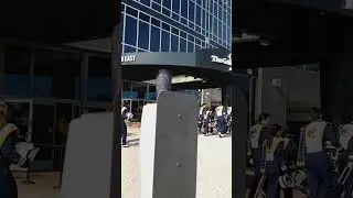 the Notre Dame Fighting Irish marching band walked by