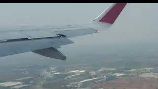 Flight wings during takeoff from Bangalore and Landing at Mumbai