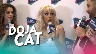 Doja Cat Reacts to Her Grammy Nominations, Favorite Food, and More!