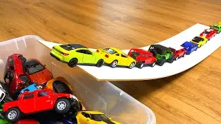 Various Bigger and Smaller Diecast Model Cars Moving Down On Slider #8