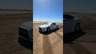 Relaxing beach walk gets interrupted by RICH IDIOT in a GTR!! 