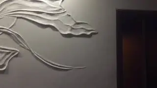 Барельеф на стене