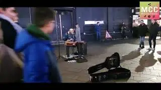 Singer and street musician plays the blues perfectly in the street
