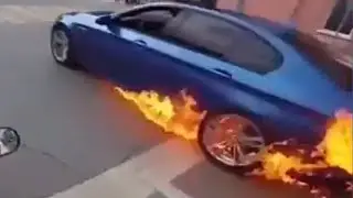 Car Sets On Fire At Intersection