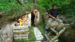 Building of a secret dugout under a fallen tree - Warm and cozy Bushcraft shelter & Fireplace